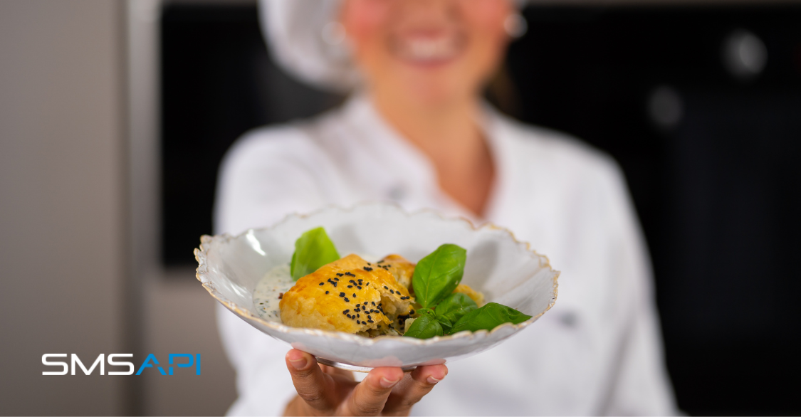 Woman-holding-plate-sms-for-restaurants